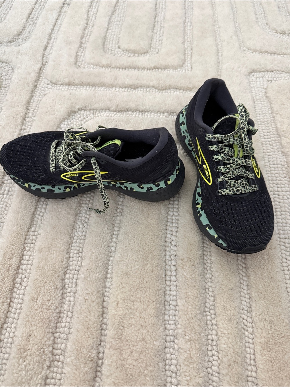 Brooks women’s Black Sneakers with Green Leopard Accents